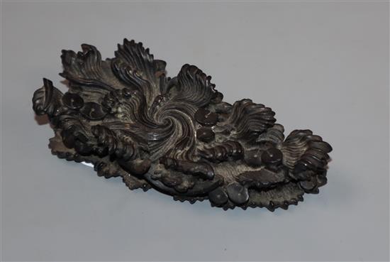 A Chinese rosewood stand, 19th century, carved as waves width 12cm